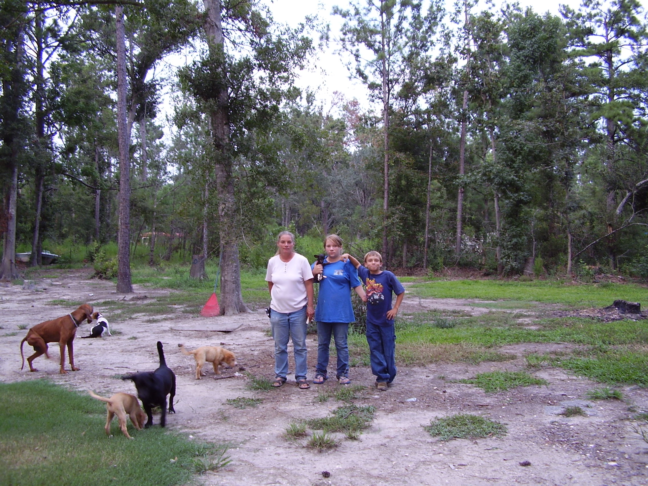 Standing where home will be.. with some of Brittany's adopted pets