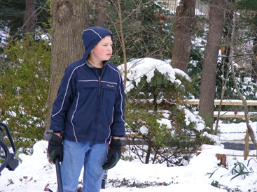 Jaxom observes the sledding technique of his siblings