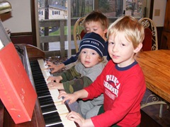 cousins playing piano